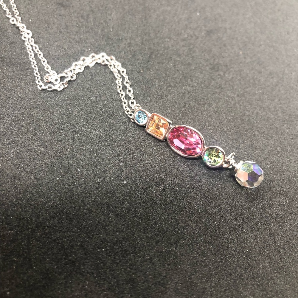 NWT Swarovski Crystals necklace. This has 5 crystals. 16” chain w/ 2”adjustment